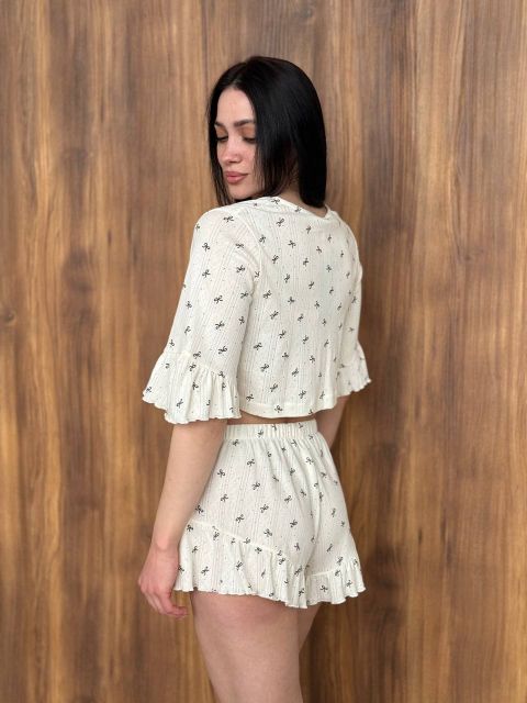 Жіноча трикотажна піжама-двійка 234-244 в принт бантик